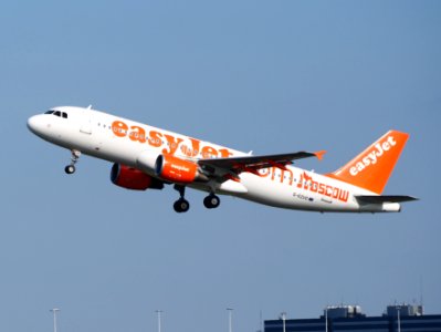 G-EZUG easyJet Airbus A320-214 takeoff from Schiphol (AMS - EHAM), The Netherlands, 18may2014, pic-2 photo