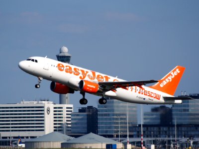 G-EZUG easyJet Airbus A320-214 takeoff from Schiphol (AMS - EHAM), The Netherlands, 18may2014, pic-1 photo