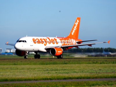 G-EZIO easyJet Airbus A319-111 takeoff from Schiphol (AMS - EHAM), The Netherlands, 11june2014, pic-1