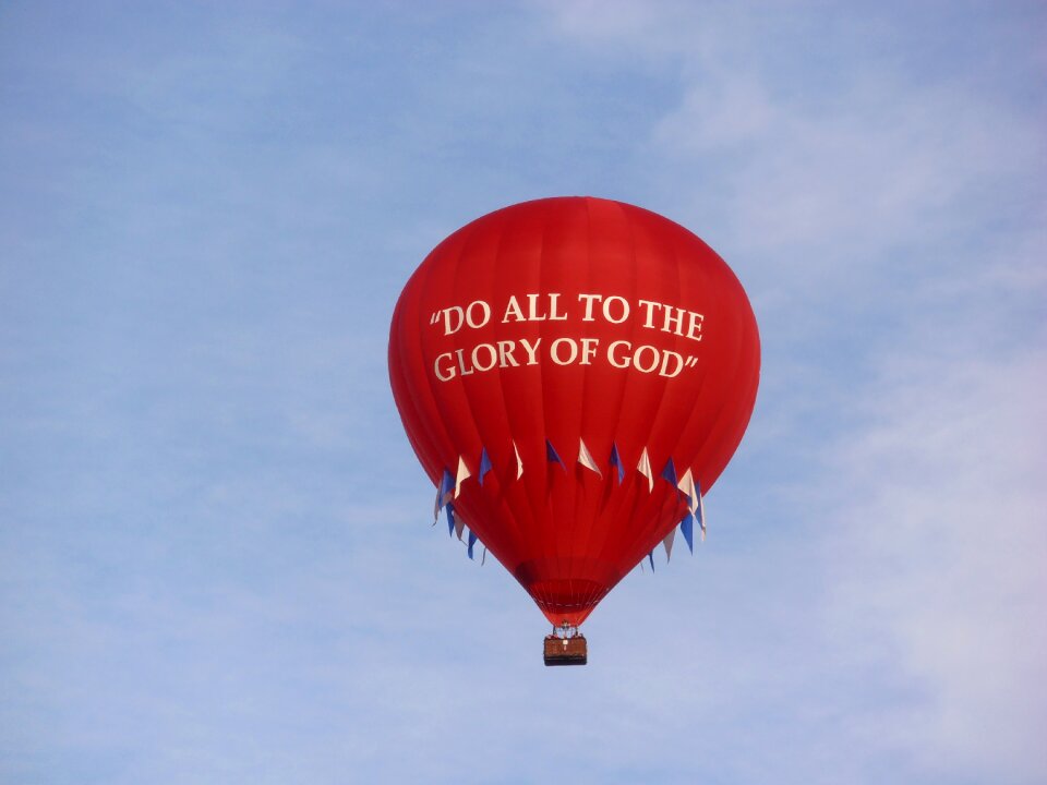 Red balloon sky blue god