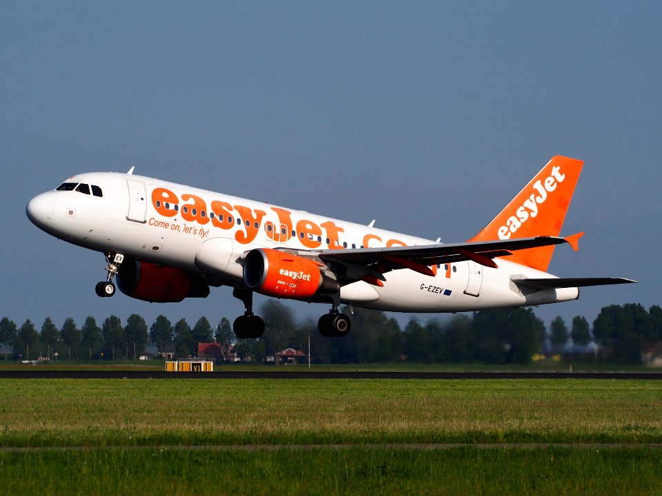 G-EZEV easyJet Airbus A319-111 takeoff from Schiphol (AMS - EHAM), The Netherlands, 17may2014, pic-1
