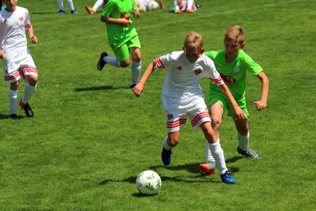 Football youth fight for the ball