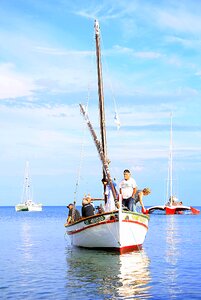 Holiday blue sailboat photo