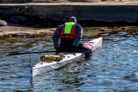 Getting into the kayak in Govik