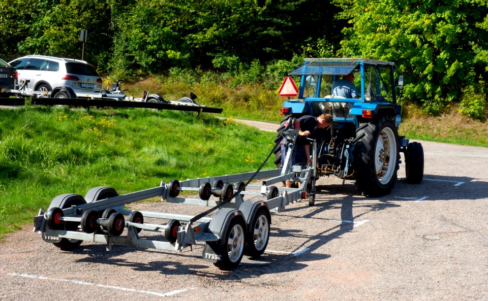 Getting the boat out of the water 1 - Hitching the boat trailer to a tractor