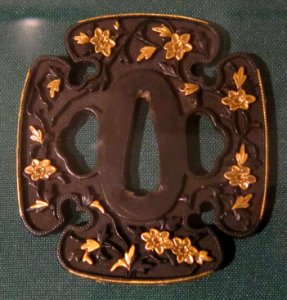 Goto school sword guard (tsuba) in hollyhock form, 19th century