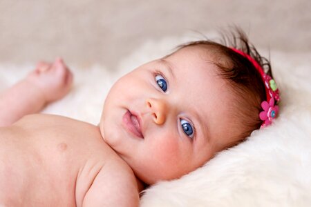 New born infant girl photo