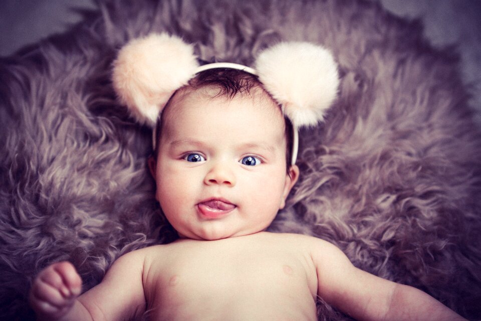 Brown coat new born infant