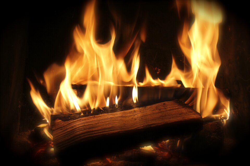 Heat wood in the process of burning sparks