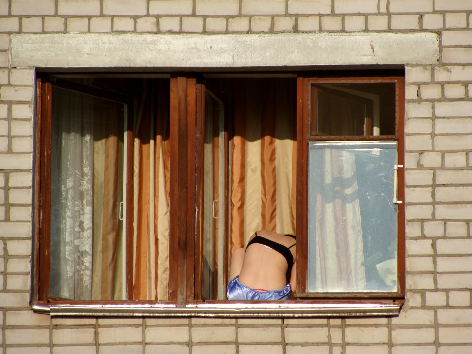 Girl sitting on the windowsill (01)