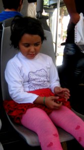 Girl sited on bus chair - Nishapur