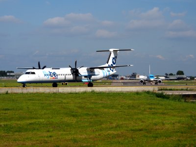 G-JEDW Flybe De Havilland Canada DHC-8-402Q Dash 8 taxiing at Schiphol (AMS - EHAM), The Netherlands, 18may2014, pic-1
