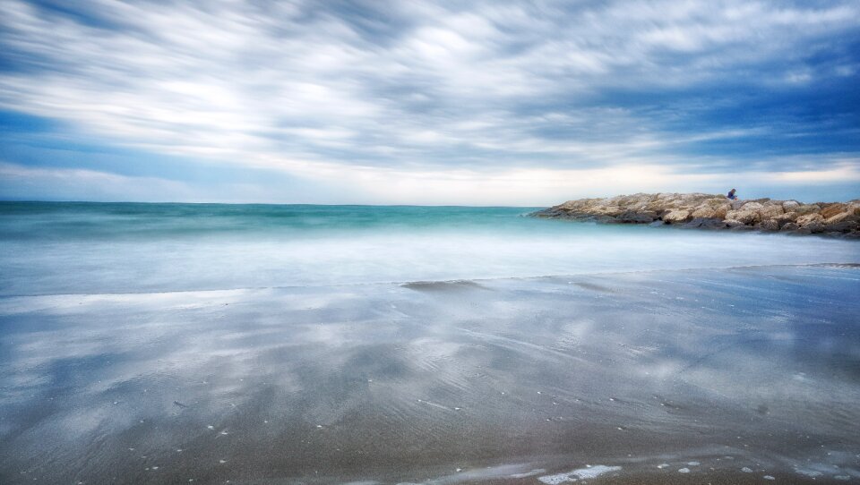 Beach coast cloudy sky