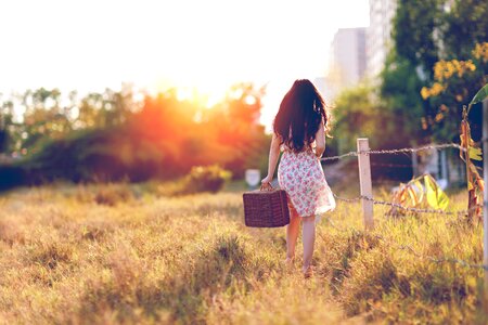 Woman basket sunset