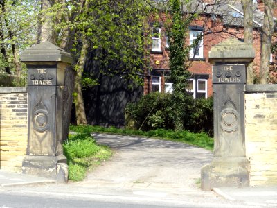 Gate Piers And Flanking Walls To The Towers