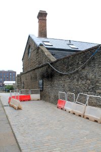 Gateway And Boundary Wall To East And West Sides Of Road