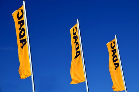 Yellow flag blow waving flags