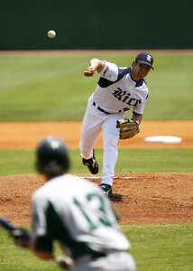 Pitcher throwing pitching photo