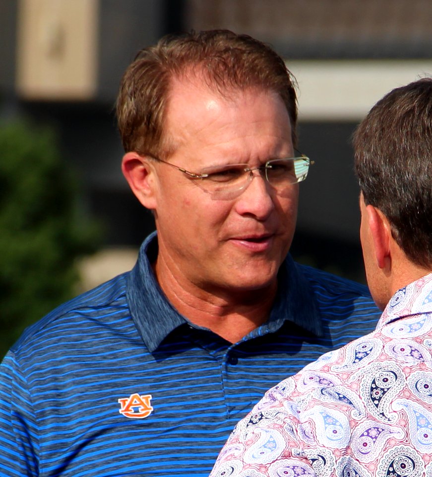 Gus Malzahn talking to Gene Chizik - 2018 SEC Summerfest (cropped)