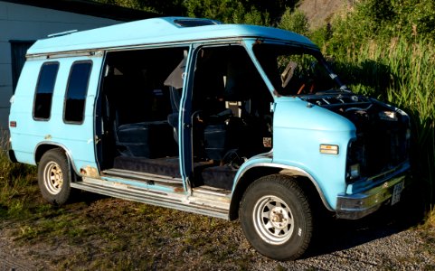 Gutted turquoise van in Amborsröd, Sotenäs