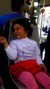 Happy girl sited on chair - morning - Nishapur 2