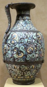 Handled ewer, late Roman, 200-400 CE, copper alloy with champlevé