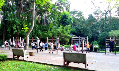 Haikou People's Park - people exercising on exercise equipment - 01