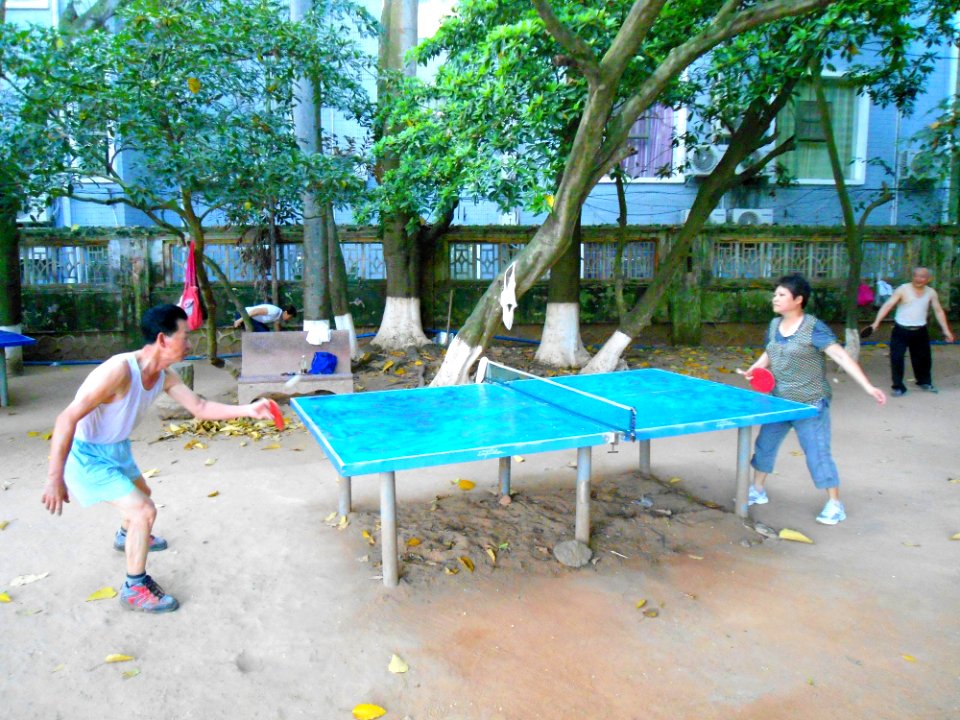 Haikou People's Park - people playing ping pong - 01