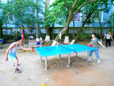 Haikou People's Park - people playing ping pong - 01