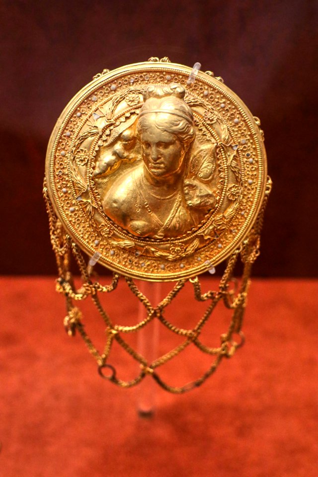 Hairnet with relief bust of Aphrodite at the National Archaeological Museum of Athens on 16 May 2018