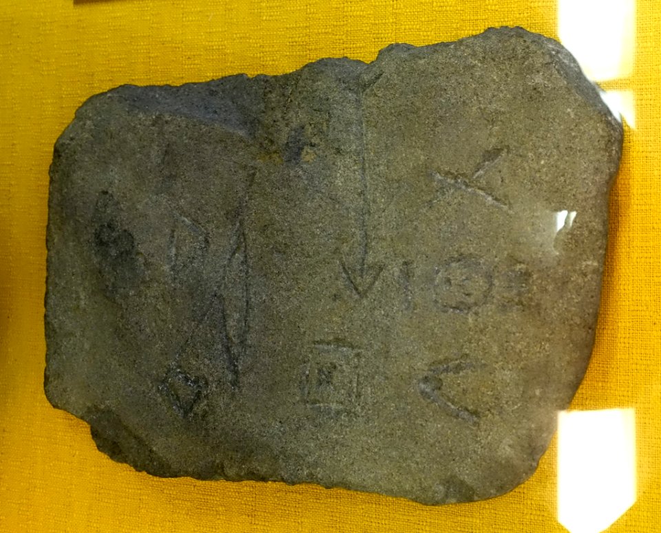 Gravestone with pictograms, Wampanoag, Dighton MA, Contact Period, 400-150 years before present, green platy argillite - Old Colony History Museum - Taunton, Massachusetts - DSC03808