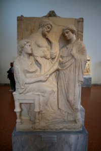 Grave stele of a maiden. 4th cent. B.C photo