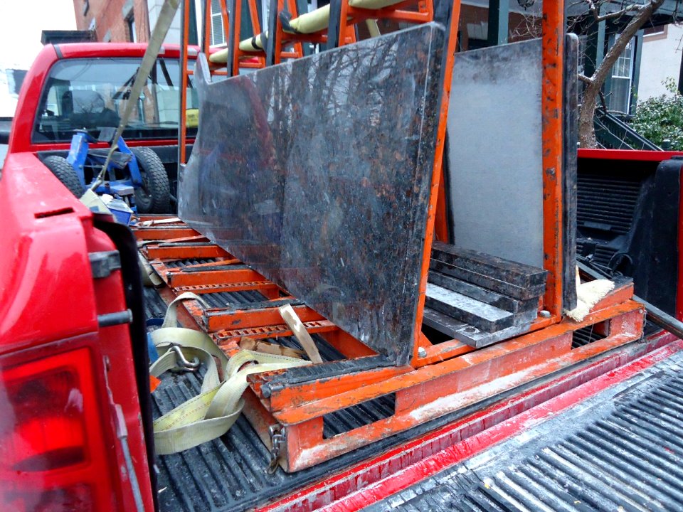 Granite slabs on a truck awaiting to installed in a kitchen