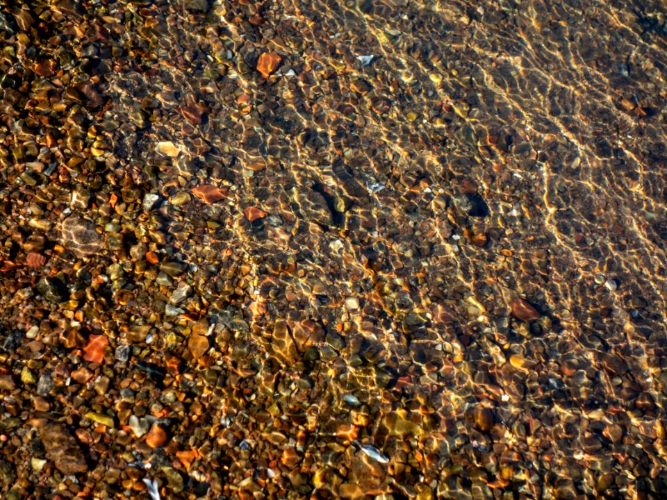 Granite gravel in shallow water 3