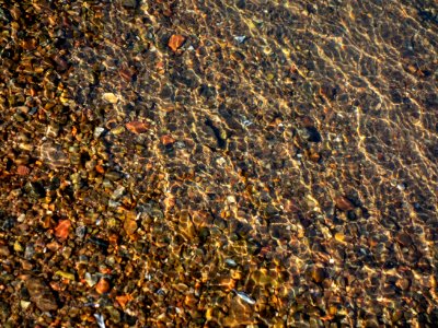 Granite gravel in shallow water 3