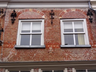 Grave Rijksmonument 17235 Hamstraat 23 siermetselwerk