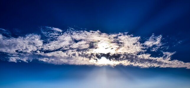 Sunbeam sunlight blue sky clouds