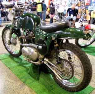 Green 1966 Métisse with a Triumph engine