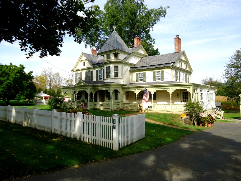 Green house with tree and driveway in Oldwick New Jersey