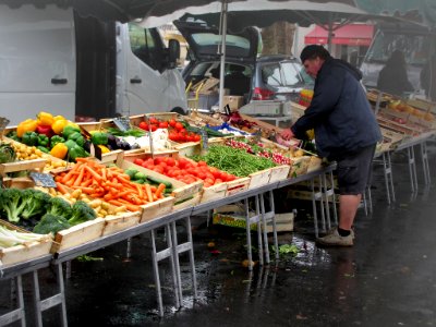 Greengrocer At A Street Market In France Dordogne (242326619)