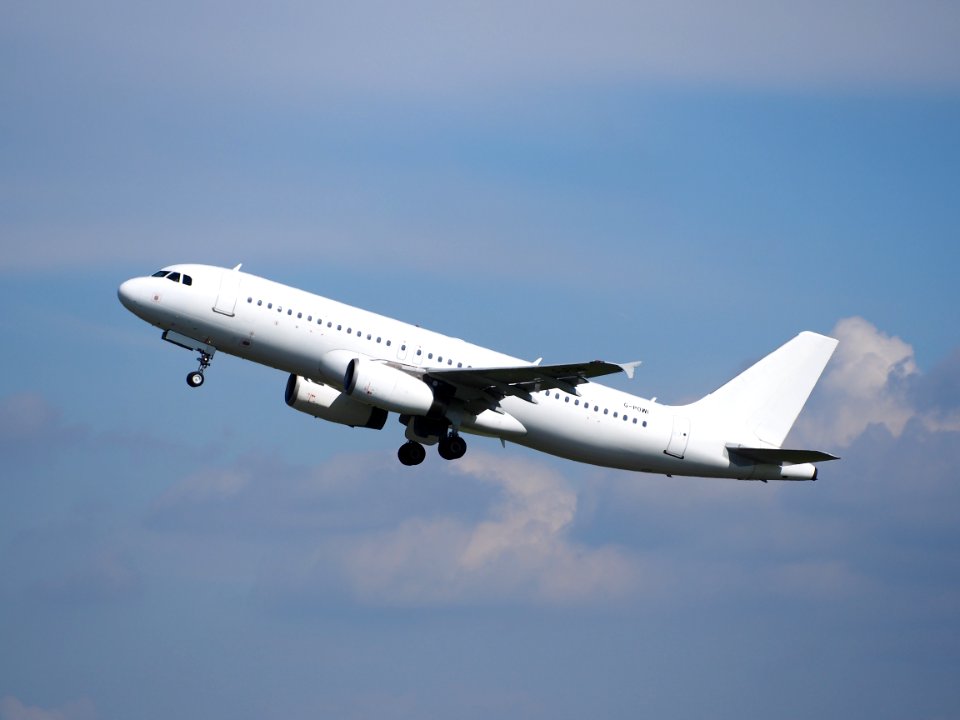 G-POWI Titan Airways Airbus A320-233 taxiing at Schiphol (AMS - EHAM), The Netherlands, 18may2014, pic-1