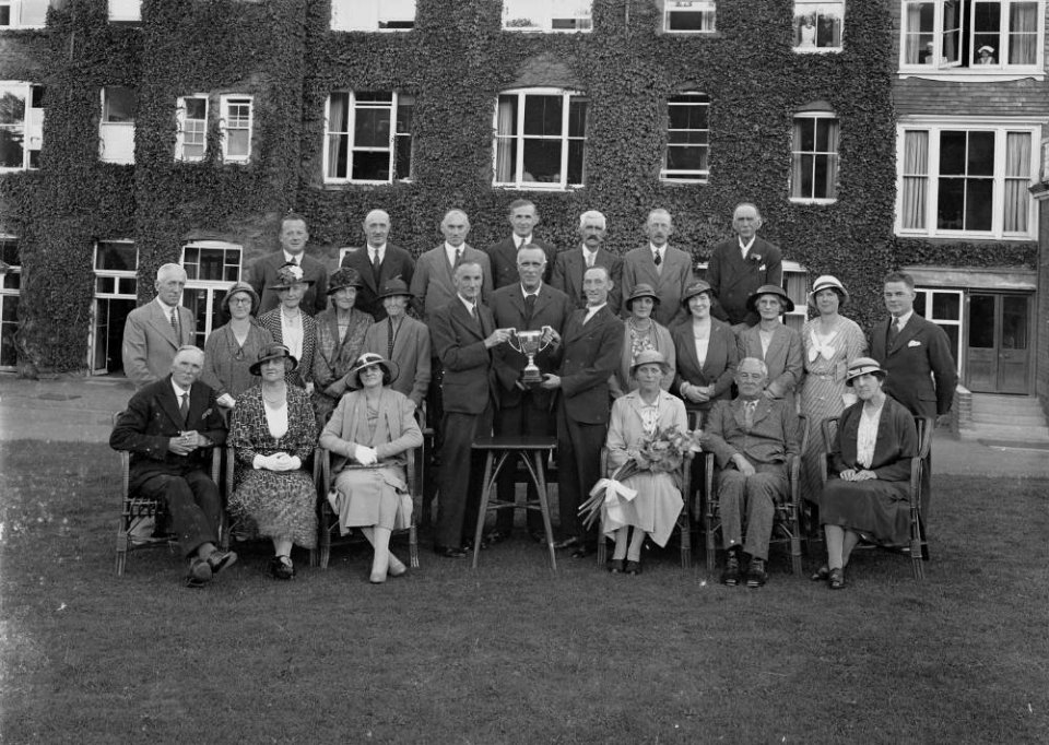 Group of men and women at a presentation of trophies (1294289)
