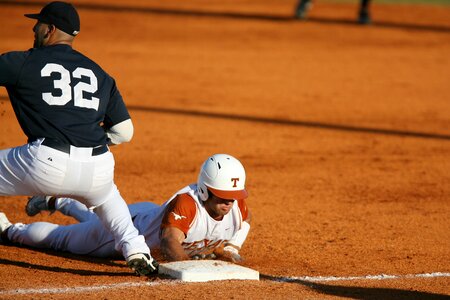 Baseball players game first base