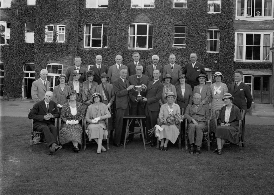 Group of men and women at a presentation of trophies (1294213)