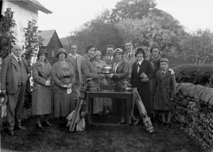 Group photo with a woman being presented with a trophy, Builth Wells (1294561)