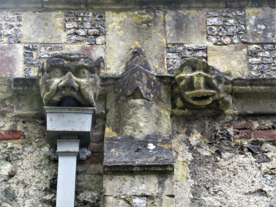 Grotesque heads, St Mary, Old Basing 01