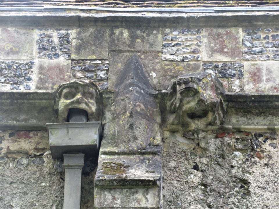 Grotesque heads, St Mary, Old Basing 02