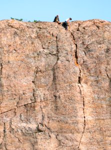 High cliff in Lyse with climbers 4 photo