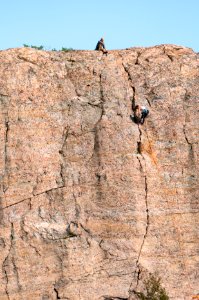 High cliff in Lyse with climbers 6 photo