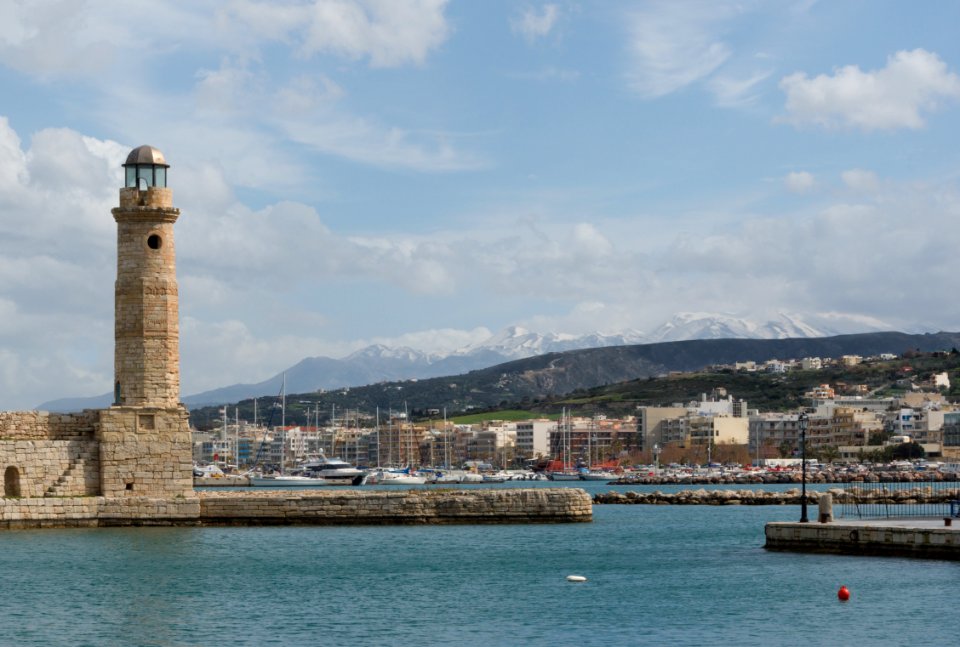 Harbour snowy mountains Rethymno Crete Greece